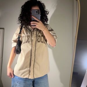 Bought at Forever 21. Size S, fits bigger. Beige/brown/tan color.